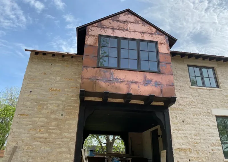 Copper metal panel facade on a stone building for Skylight Installation in Schuylkill Haven