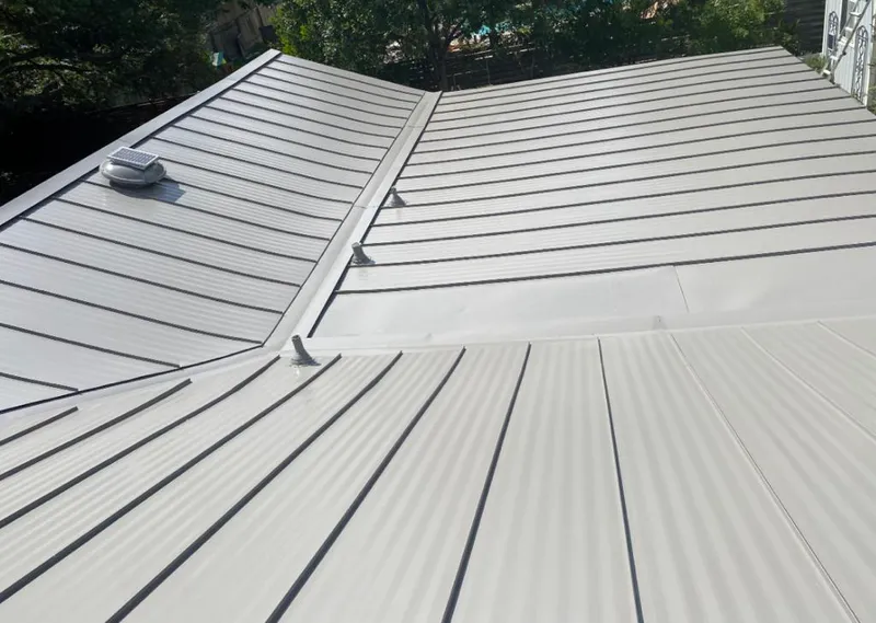 Solar attic fan installed on a metal roof for Roof Ventilation in Schuylkill Haven